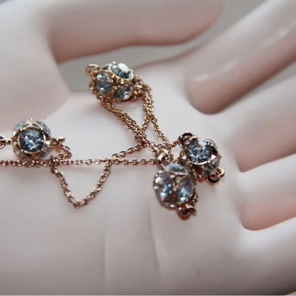 Kate Spade ♠️ Lady Marmalade Rose Gold/Clear Crystal Necklace.
NWT - Picture 9 of 12